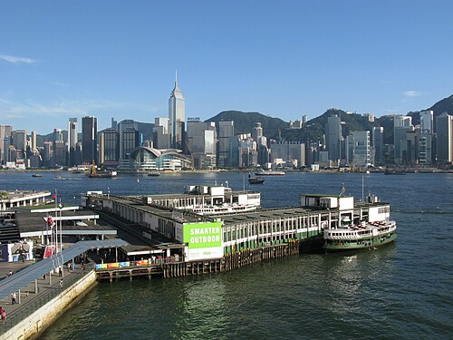 Star Ferry arriving beside Tsim Sha Tsui Ferry Pier in Hong Kong